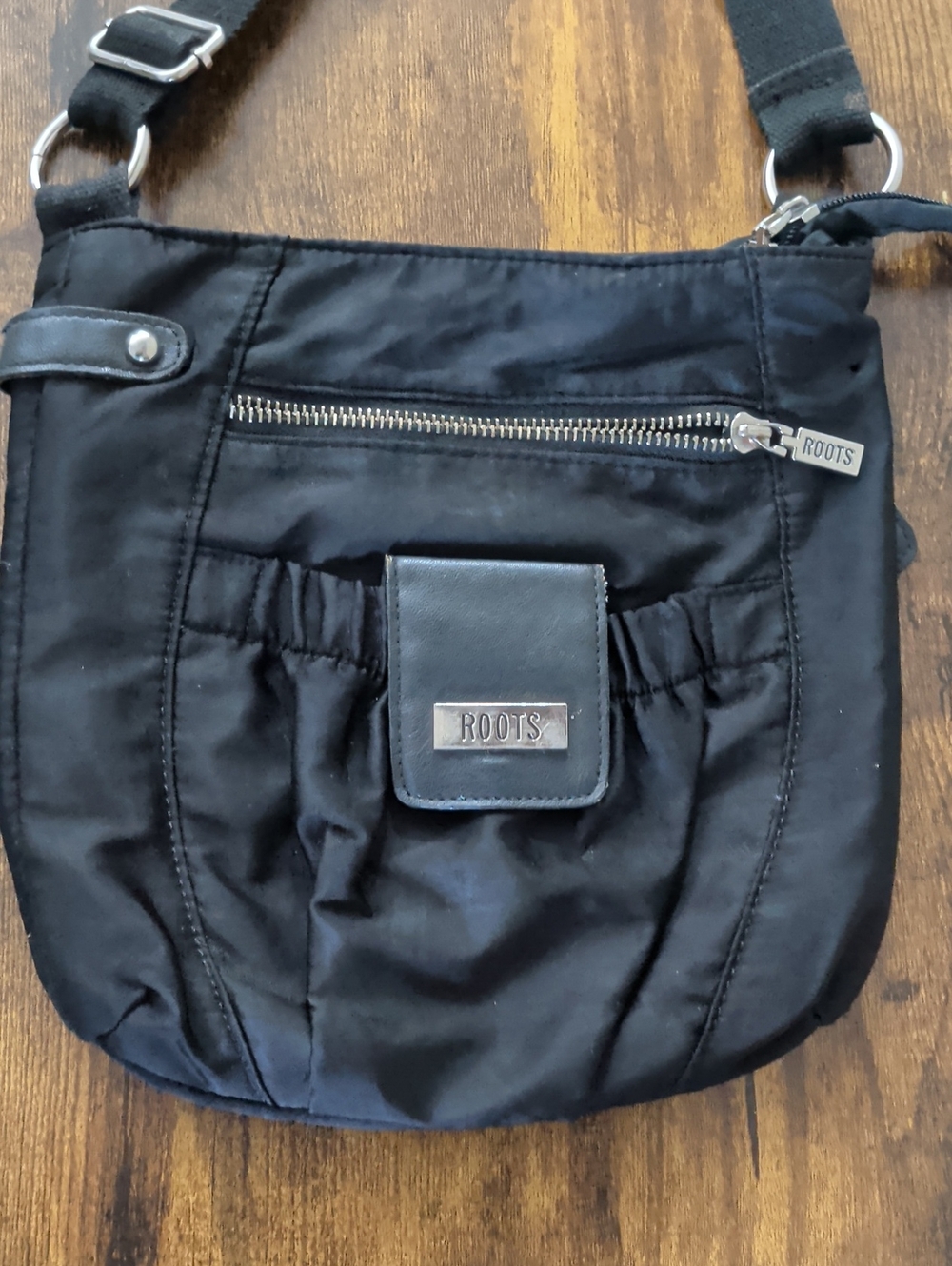 Roots Black Crossbody Bag with Silver Hardware